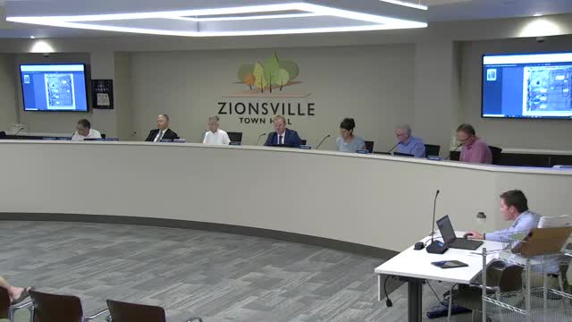 Zionsville BZA approves canopy variance for building at 10701 Deandre Drive B with condition limiting encroachment to canopy