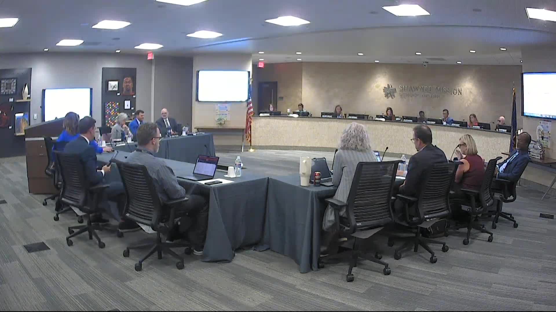 Board reviews multiple policy revisions in first reads, including military enrollment and open-meetings language