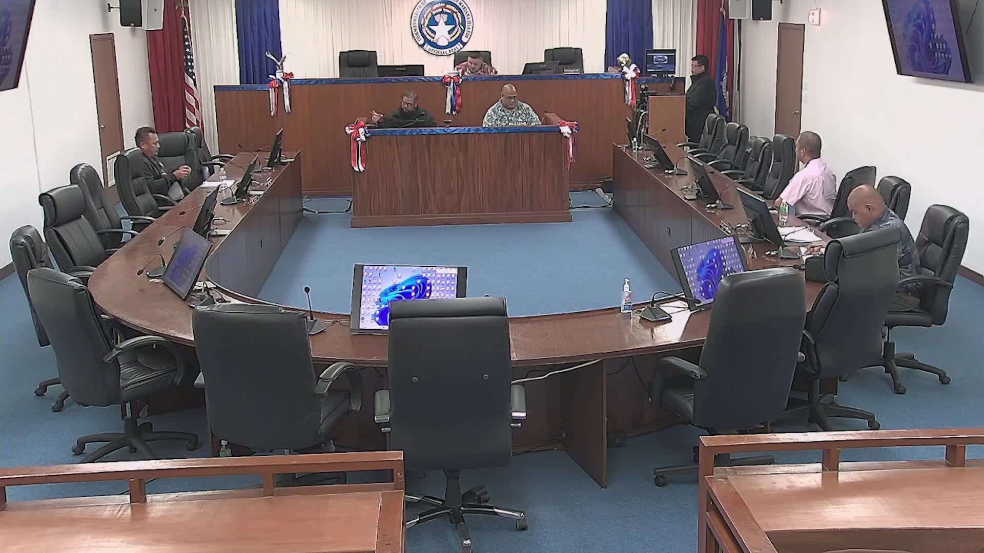 Committee adopts two bills, tables two others; staff to prepare reports