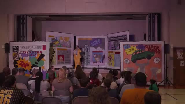 Dakota Players perform superhero show at Hawthorne Elementary; transcript records no civic business