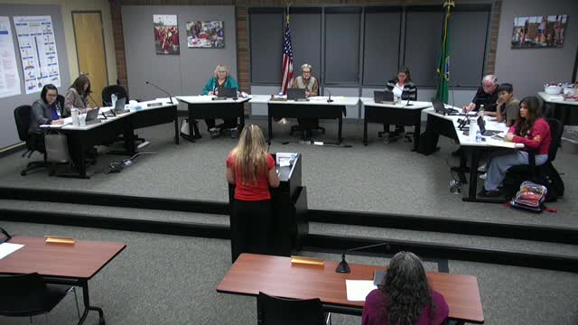 Community members urge board to support teacher cleared by district investigation; board says legal process limits comment