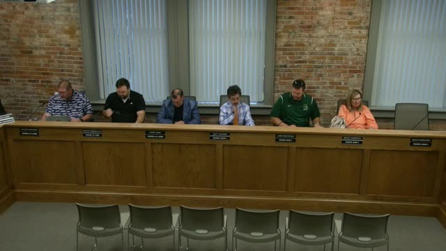 Amherst finance committee excuses absent director, records unanimous procedural votes and adjourns