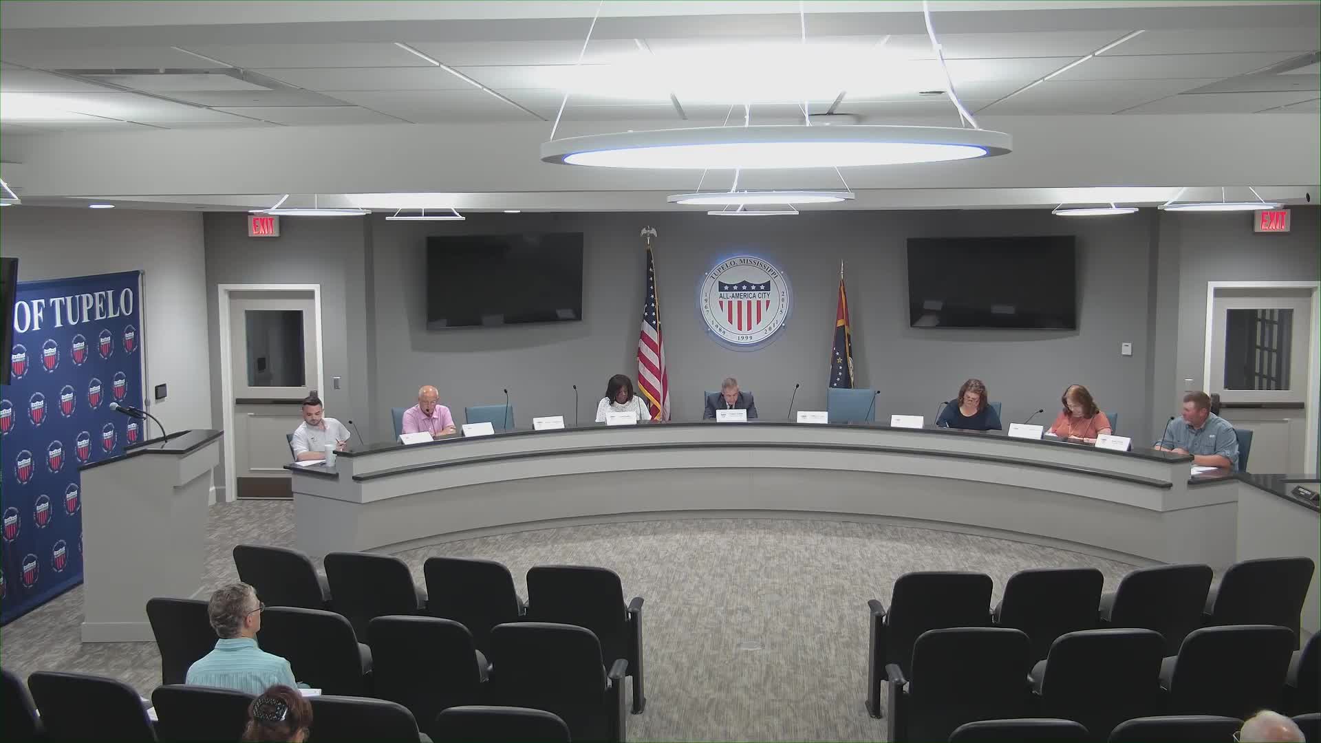 Tupelo planning committee rescinds earlier rezoning approval, then reapproves rezoning and recommends 10‑lot subdivision with tree‑replacement condition
