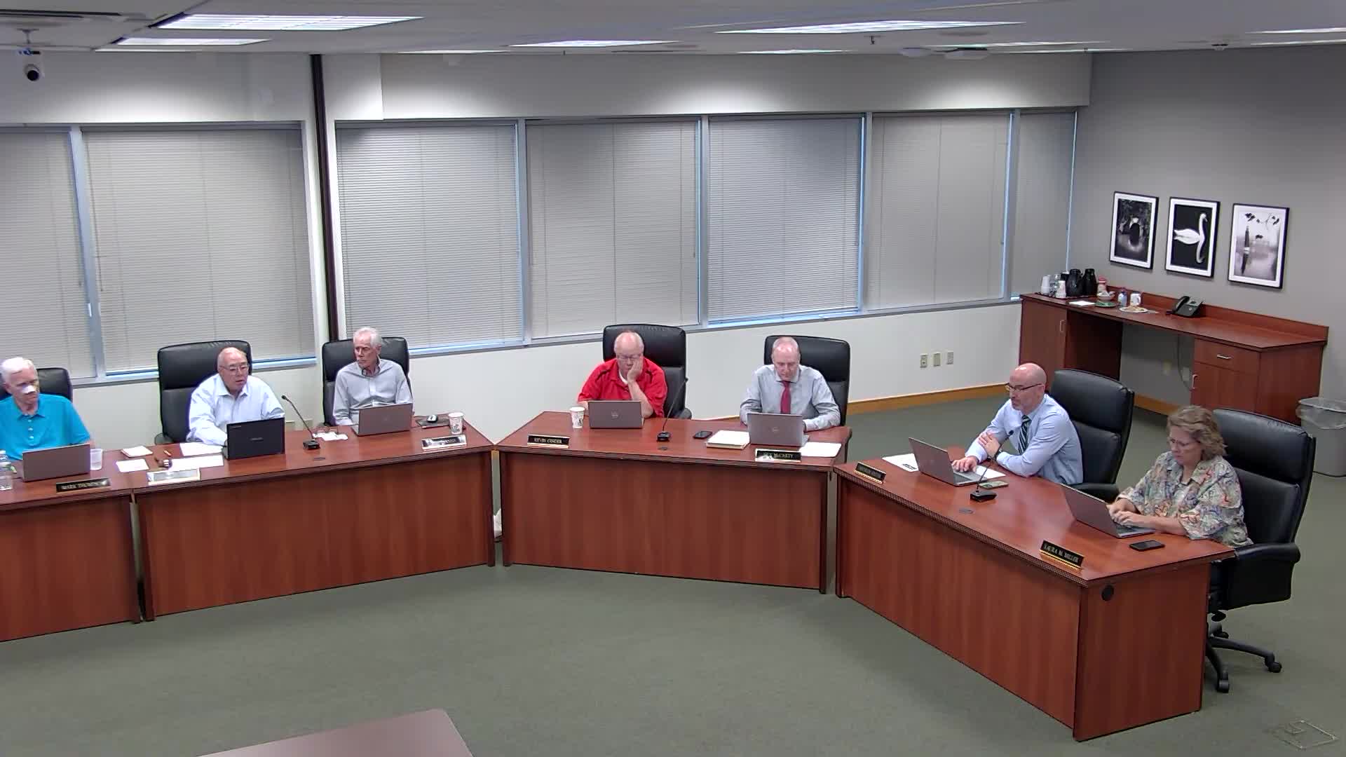 Board approves routine consent items, budget resolutions and bus financing; multiple motions passed by roll call