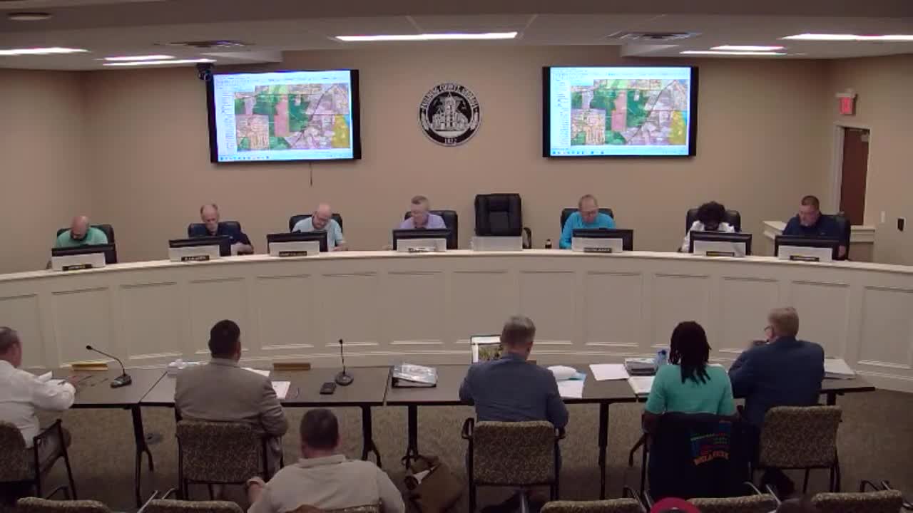 Commission recommends approval of Powder Creek rezoning for 21 single‑family lots, adds conditions