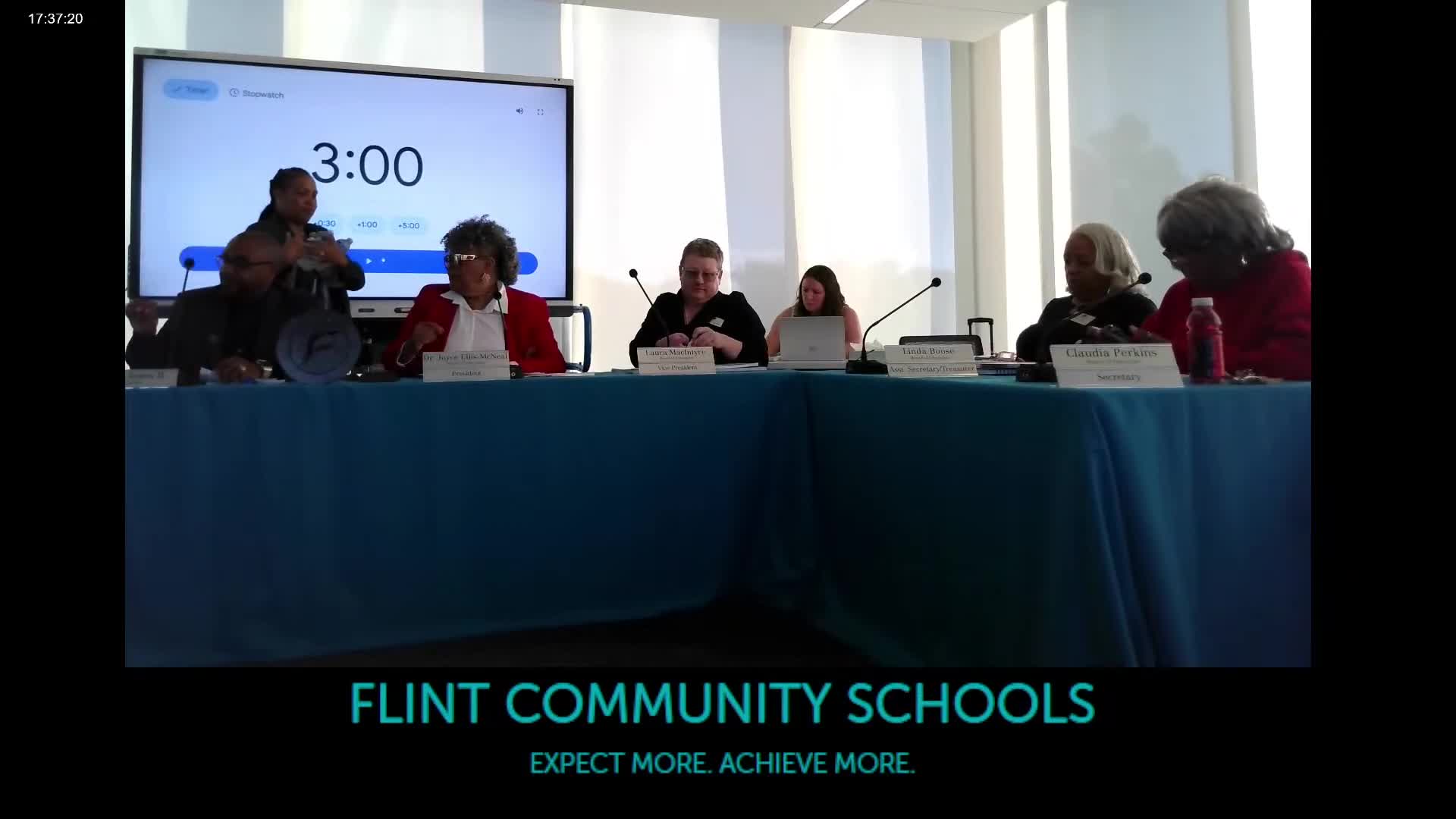 Housing commission and a national education firm pitch door‑to‑door reengagement, home visits and student advocates to Flint schools