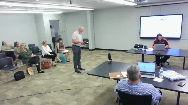 Board preapproves parameters for bond refinancing; approves construction change orders and hears construction update