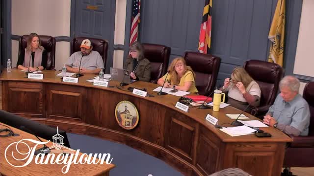 Board told contractor repairs left tot‑lot surfacing uneven; replacement parts ordered for damaged equipment