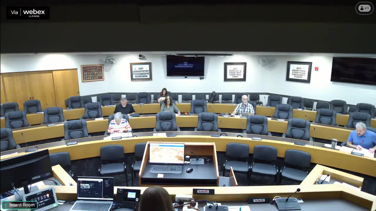 Committee clarifies SafeBuilt contract terms and hears construction‑permit report including MET tower for small 5 MW project