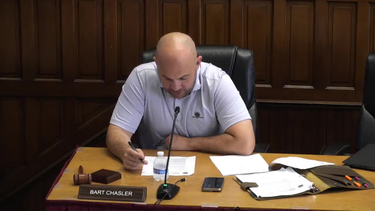 Board approves wood replacement windows at 26 West Boscawen Street after applicant returns with wood option