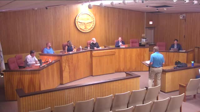 Paul’s Auto Wash site plan postponed after debate over vintage pole sign and landmark status