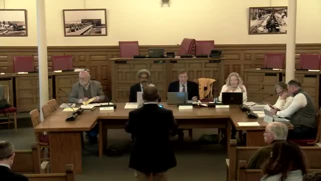 Commission pauses greenhouse-manufacturing application after neighborhood opposition; directs applicant to consult neighbors and staff