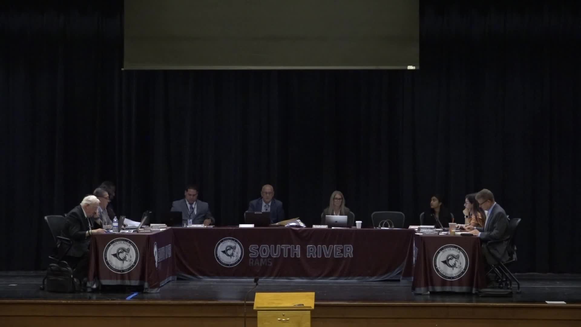 Board approves consent package including budget calendar, security-camera and curriculum contracts