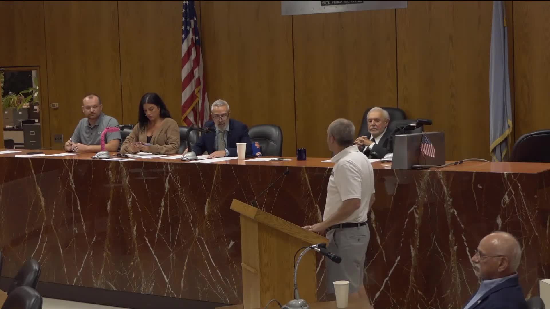 Residents raise nuisance property, bus‑stop removals and police harassment in public comment