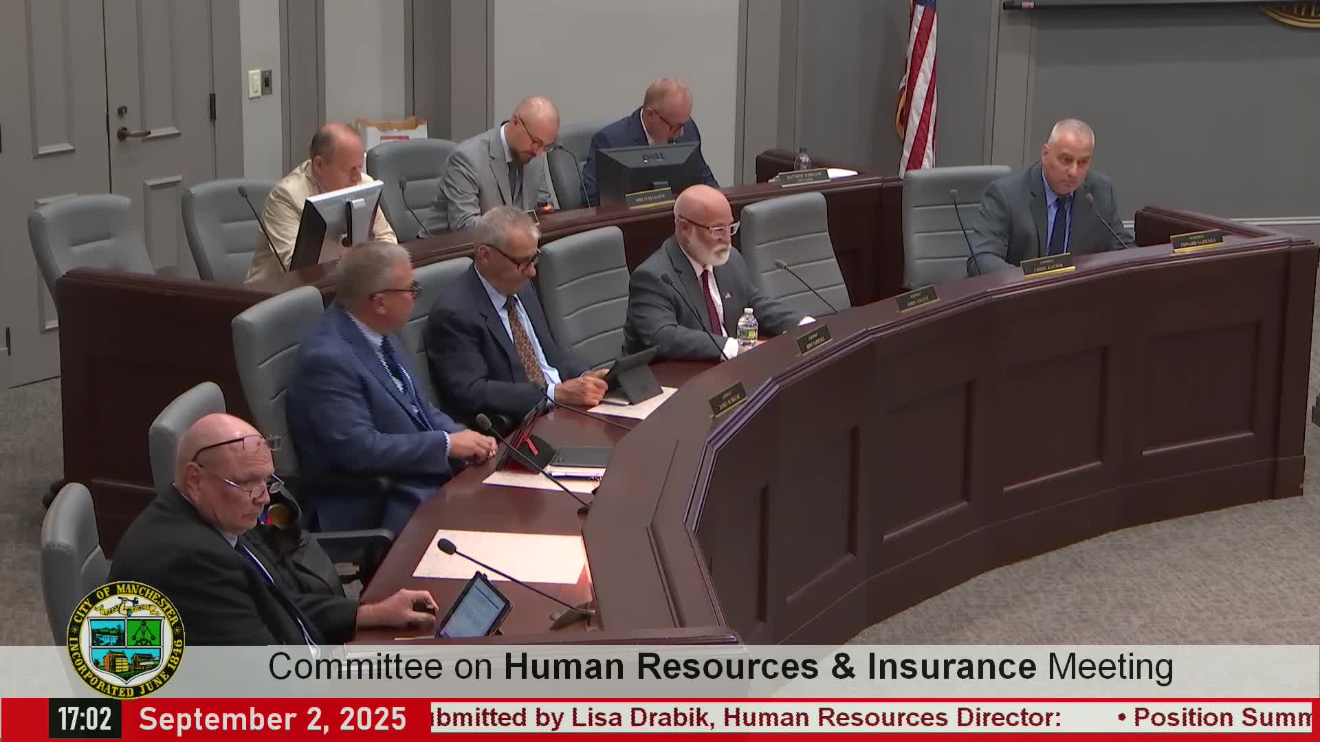 Committee approves adding third on‑call veil inspector to Public Works roster