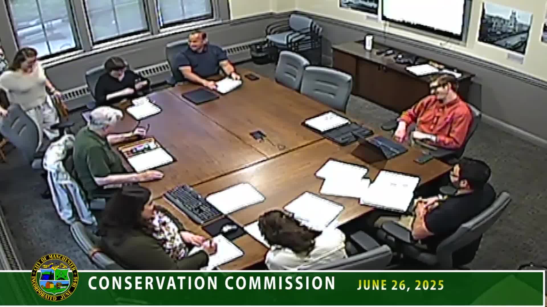 Conservation commission recommends planning-board approval of three‑lot subdivision at 145 Garvin Avenue with wetlands placard condition