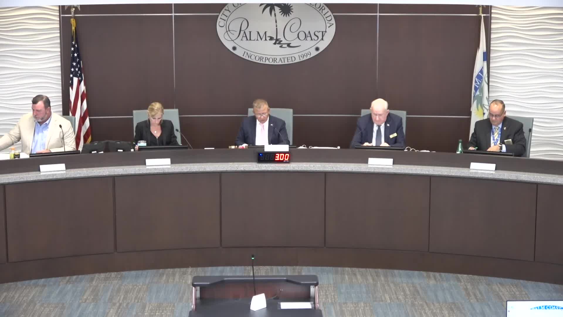 Palm Coast approves future land‑use and rezoning for 38.8‑acre site on State Road 100; council presses developer on traffic mitigation