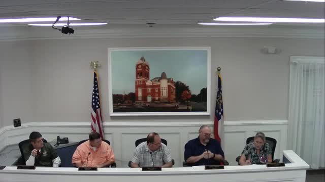 Commissioners approve base-pay raises for county employees