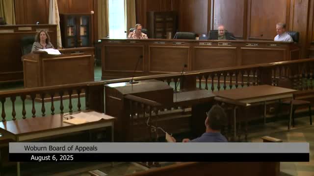 Woburn Zoning Board continues special-permit review for 162 Montvale Ave amid questions on height, drainage and parking