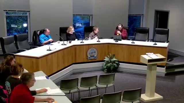 Executive committee readies staff evaluation and flags director liability insurance