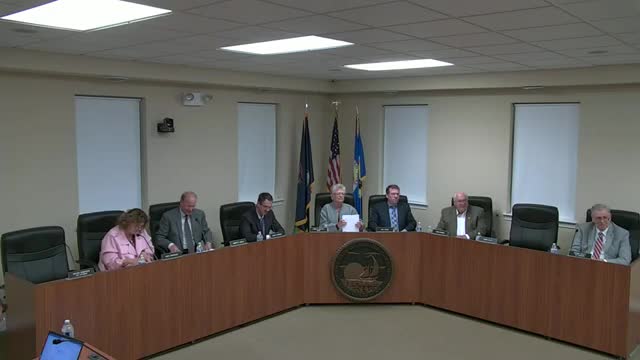 Resident accuses city officials of misappropriating stormwater and sewer funds; council and city manager deny allegations