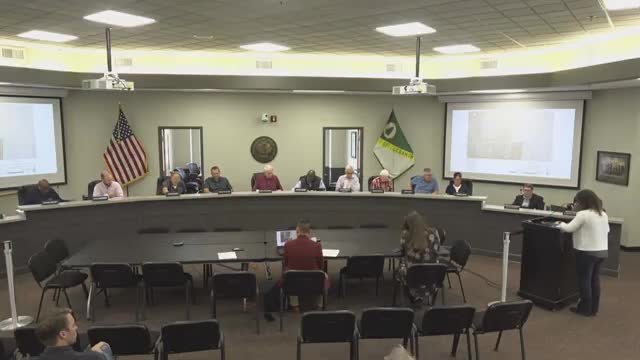 Planning commission reviews several minor plats and site plans, including a duplex variance and an auto-sales site plan