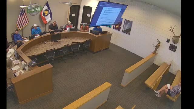 Board amends minutes to classify lots 6C and 7C as nonbuildable, excludes road and water fees