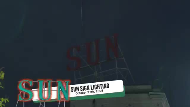 Lowell officials and community mark relighting of historic Lowell Sun sign after multi‑year restoration