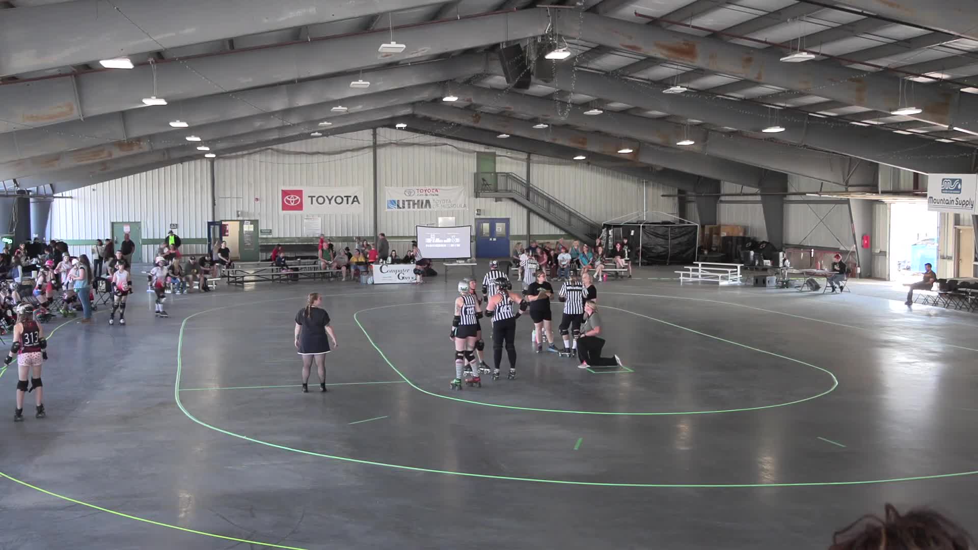 (No civic items) Missoula roller derby bout features promotions, timeouts and injury-related stoppage