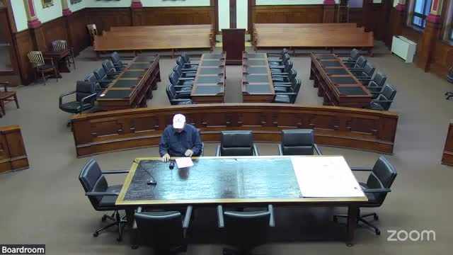 Owner seeks rezoning of 10-foot strip to join subdivision; township approval, woodland easement recorded