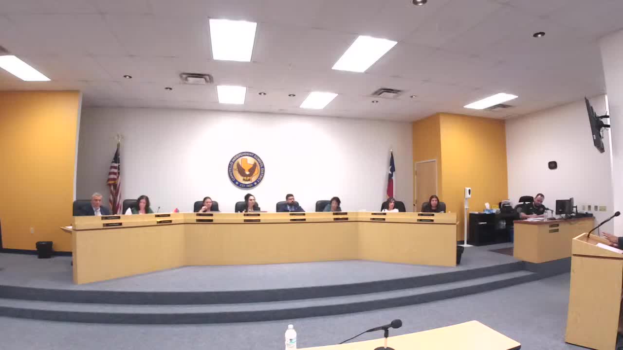 Trustees debate posting donated Ten Commandments posters; motion made to delay pending litigation