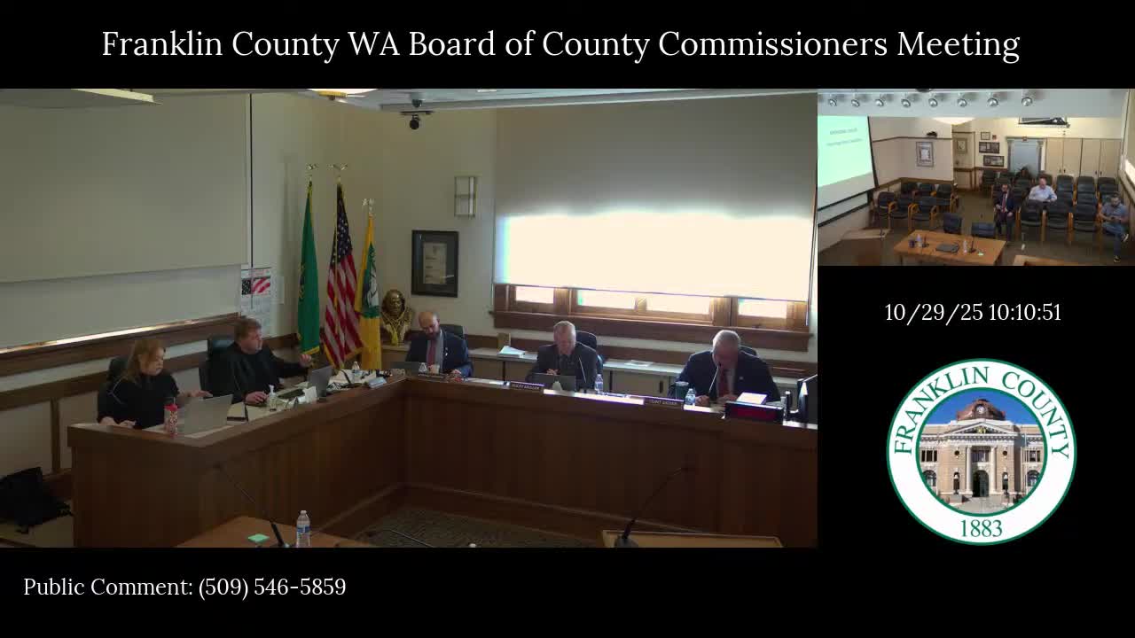 County administrator presents spending‑freeze draft and revised financial policies; board asks for refined options