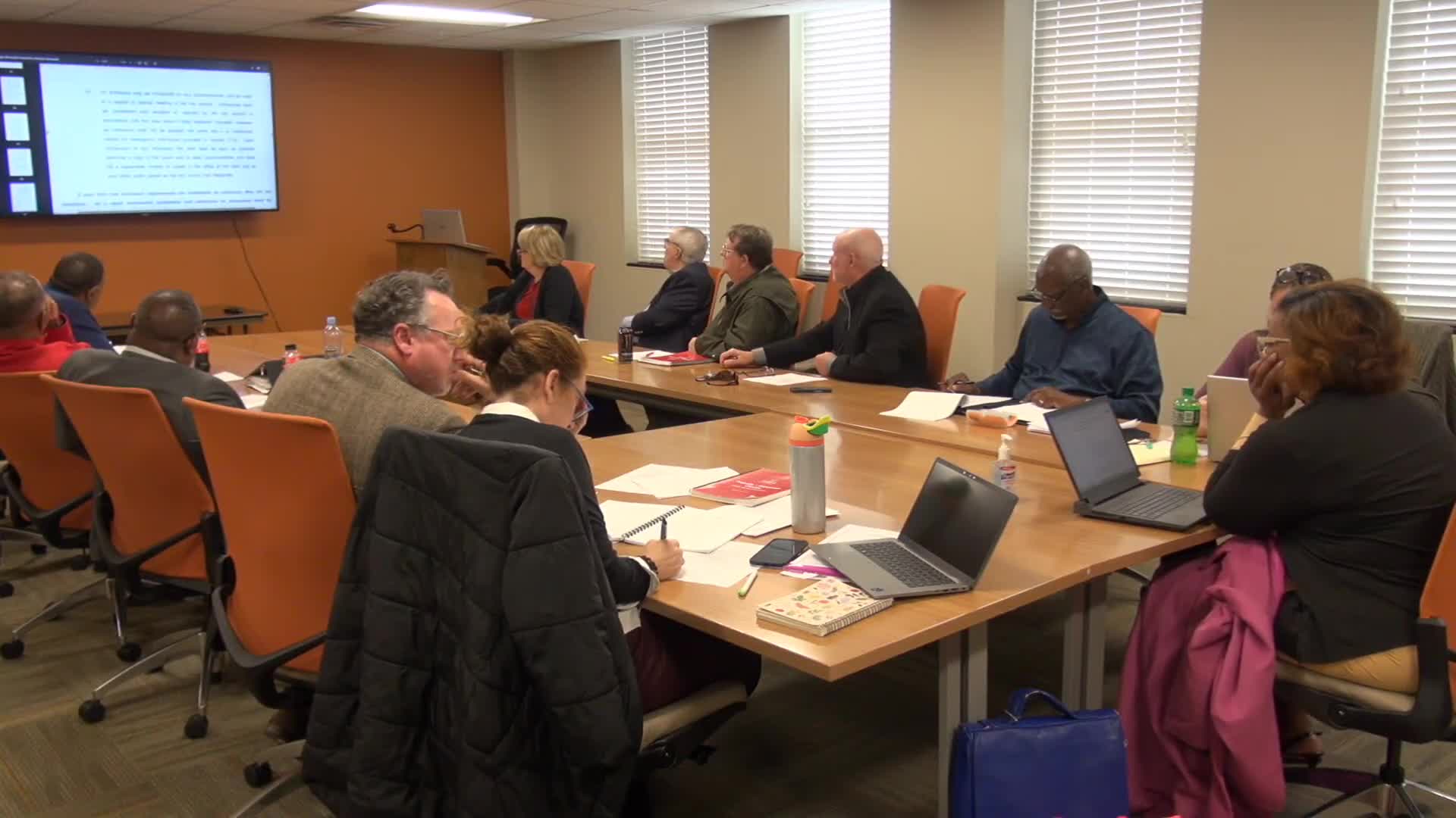 Committee reviews emergency meeting rules and raises questions about term limits and board composition