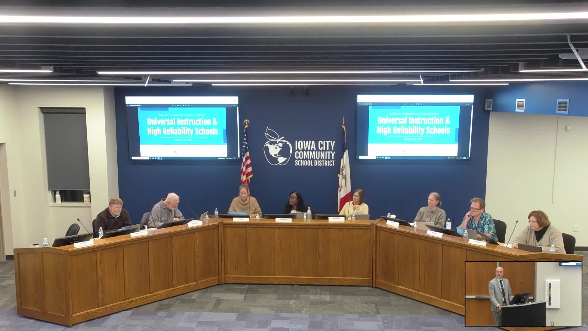 District outlines universal core instruction and HRS Tier 1 work including PLCs, screeners and an 8-year curriculum review
