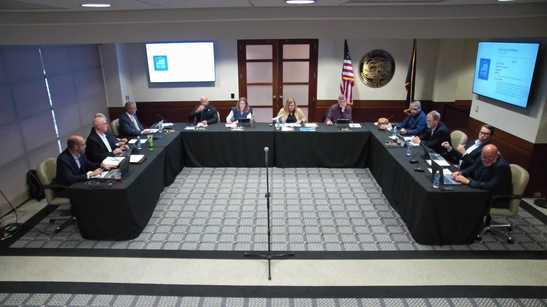 Council approves first reading for MXU rezoning of old mill site; developer pledges employee housing and parking deck