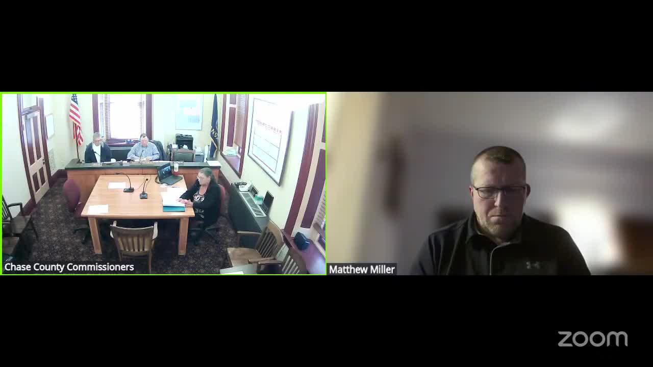 Commissioners open workers'comp bids and hear health-insurance proposals; decision deferred