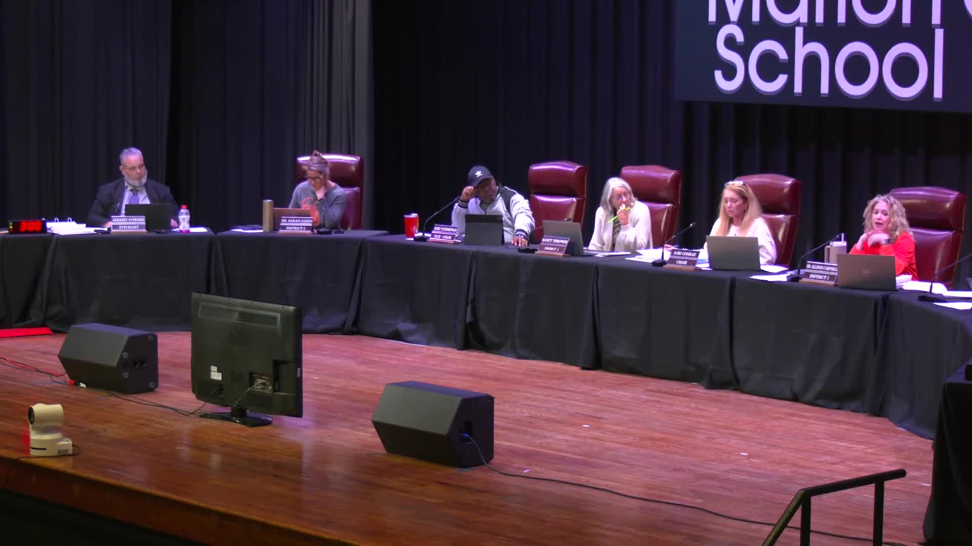 Board discusses requiring kindergarten benchmarks for first‑grade entry; member to pursue legislative option