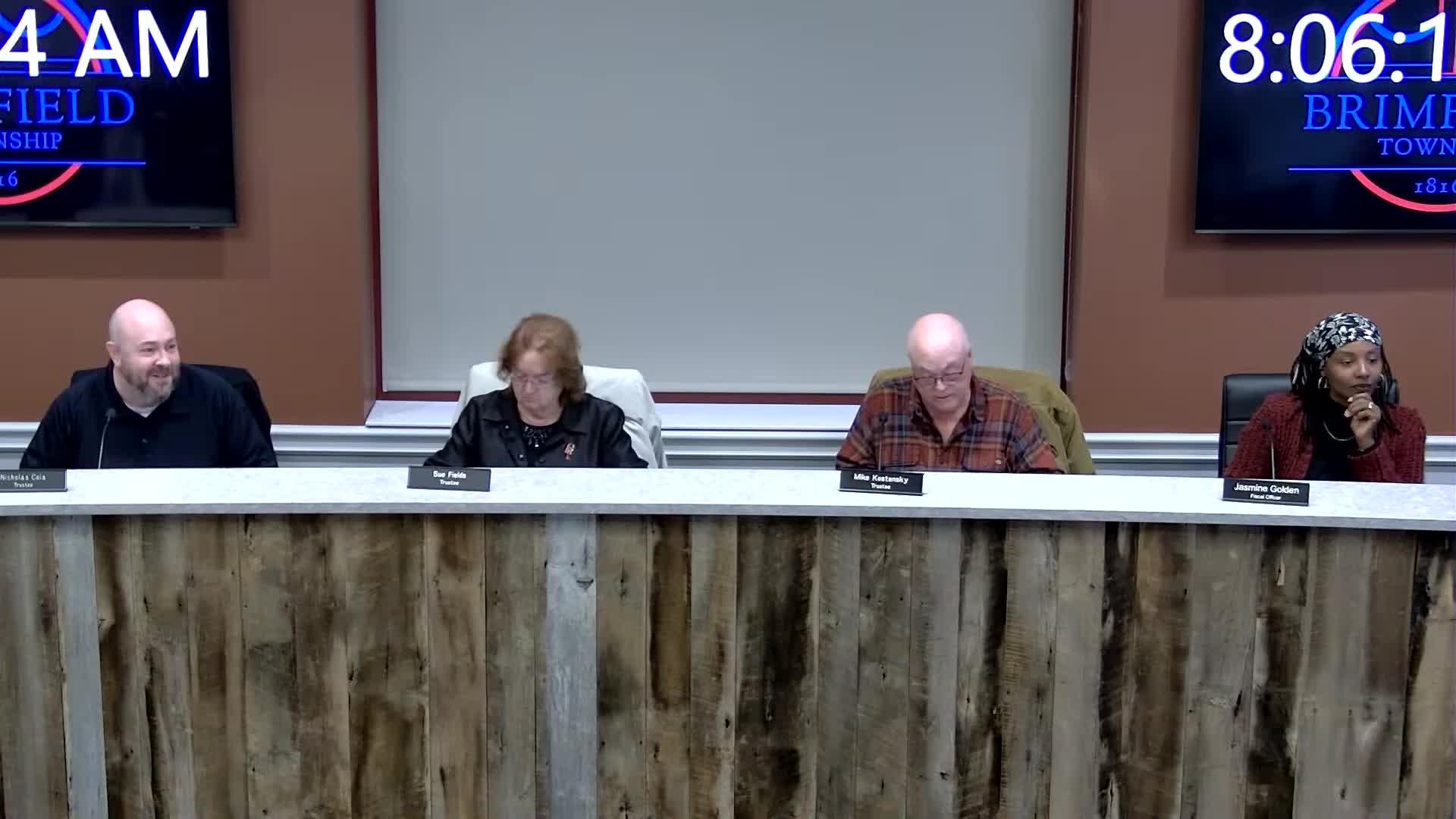 Residents press trustees over poor roadway finish; roads staff say crack sealing and ditching planned