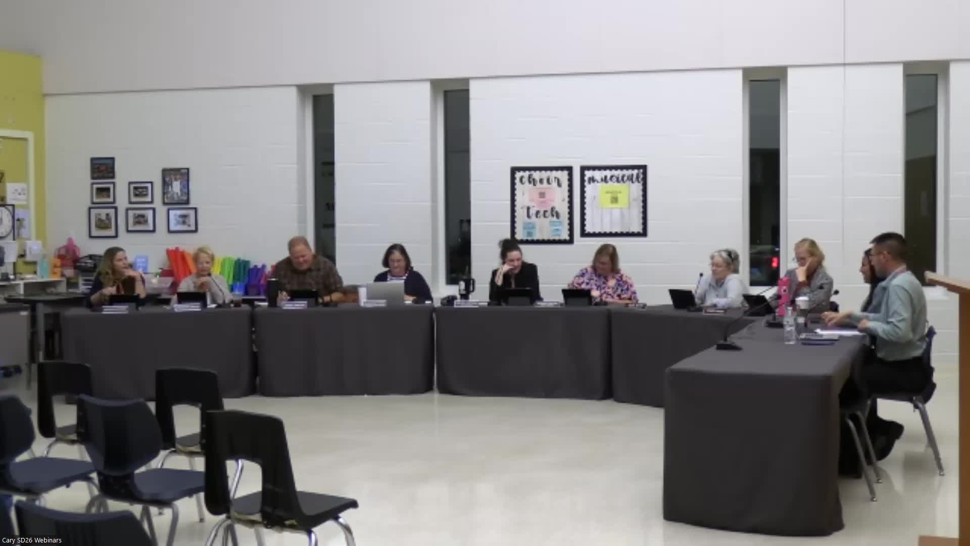 McHenry County mutual-aid agreement described to Cary D26 board; minimal fees and no mandatory reimbursements