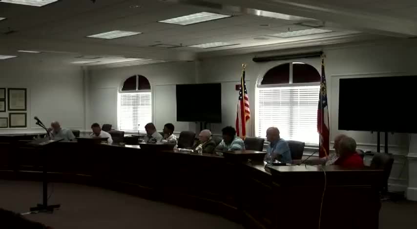 Commission enters executive session on personnel and real estate; reports no action upon return