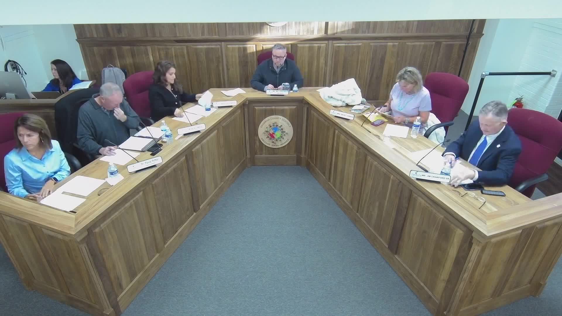 Board approves personnel, Apple lease-purchase and McKinley lease; tables East Bank fields