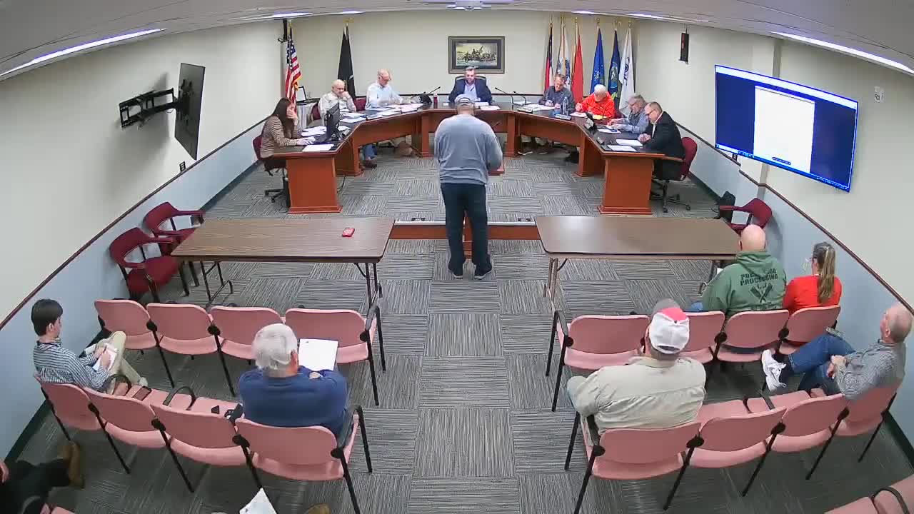 Planning & Zoning recommended denial for proposed commercial truck-parking lot; board discussion highlights stormwater and open-permit concerns