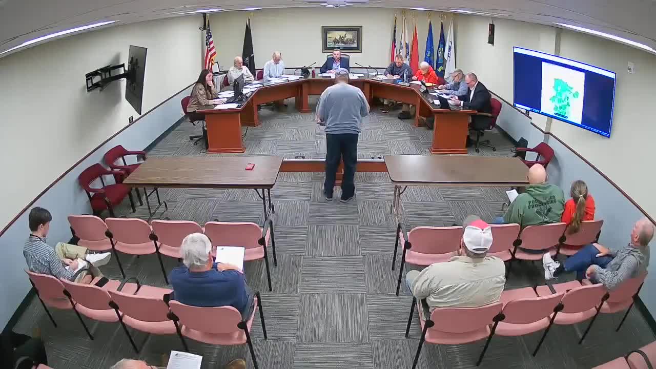 Madison County grants variance to move poultry composting structure closer to existing houses, conditioned on NRCS-engineered site plan