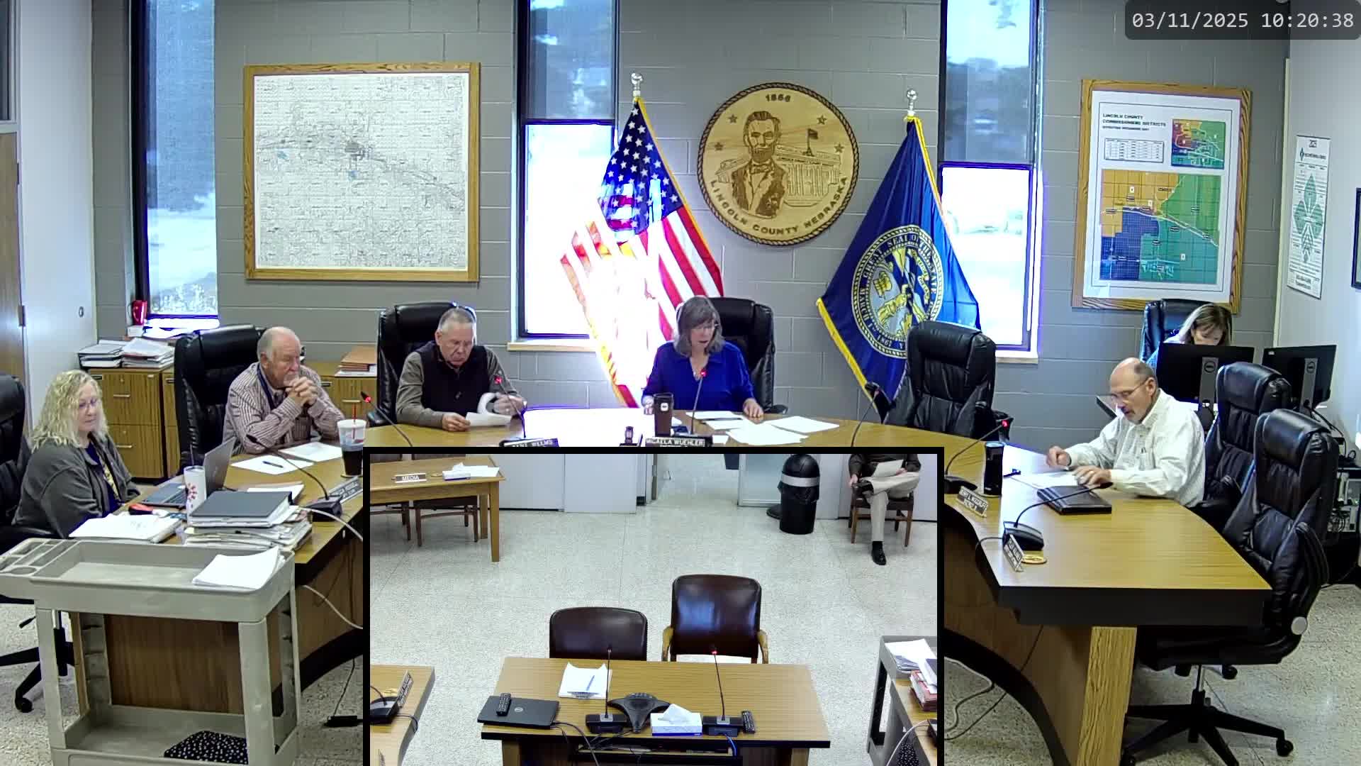 Commissioners note courthouse lighting for Veterans Month and discuss wage-and-salary study webinar