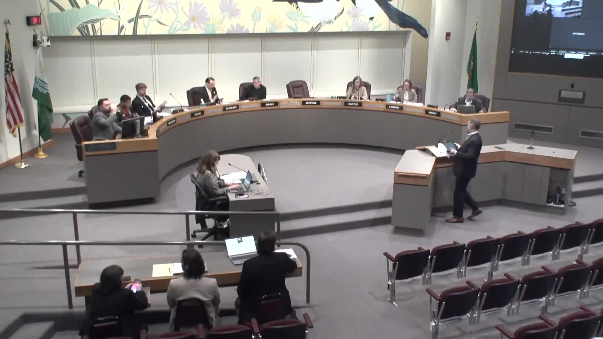 Spokane finance staff detail mid‑biennium cuts and propose commercial parking tax to shore up revenue