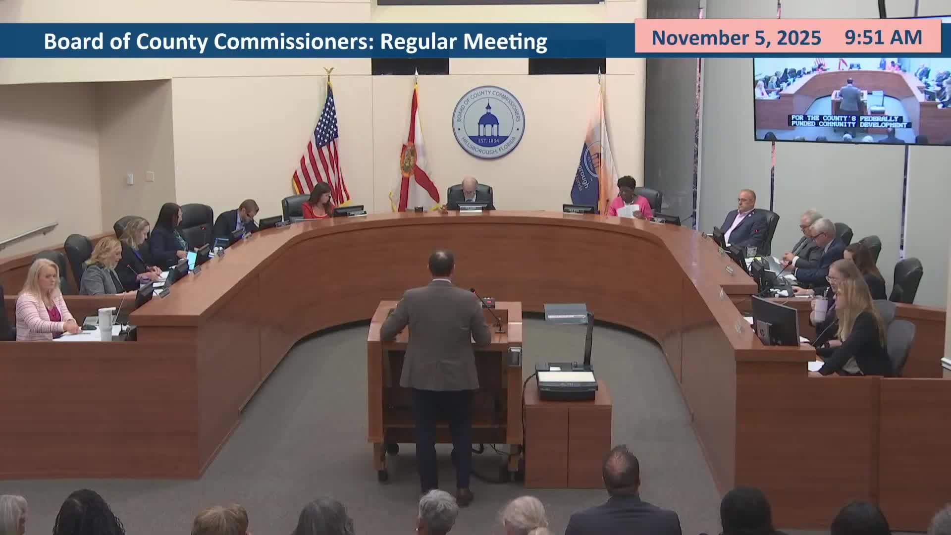 Board directs staff to split CDBG‑DR implementation between top two ranked firms after competitive review