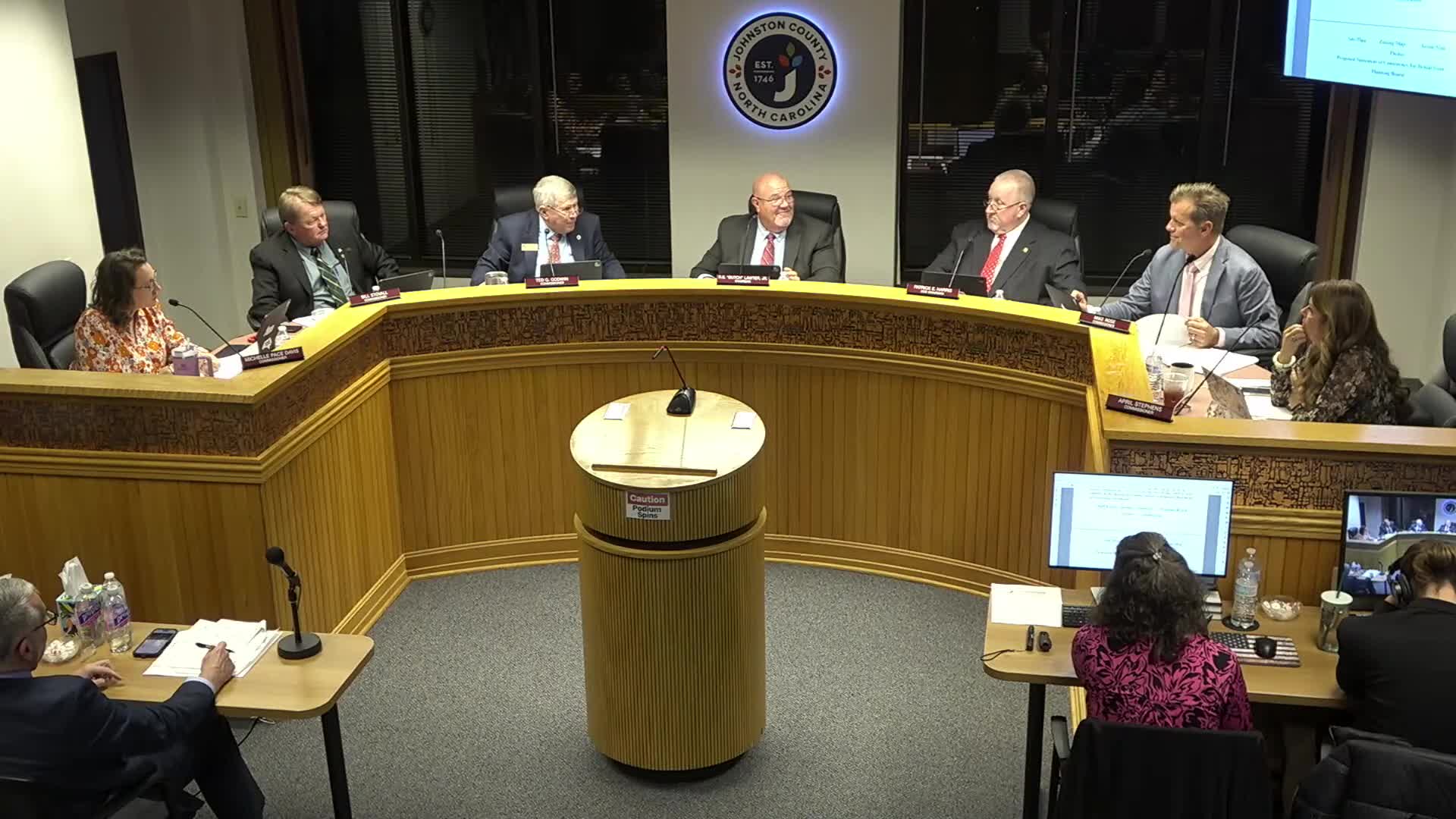 Commissioners approve revised budget, award pump‑station contract for Corinth Holders Elementary; funding gap remains to be resolved