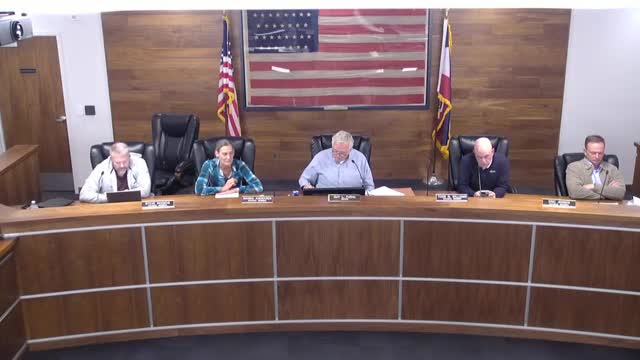 Council reviews North Grove subdivision and two site plans; planning director reports state housing compliance