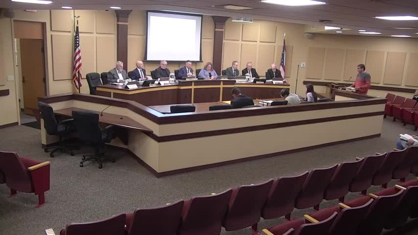 Commission adds pedestrian barrier and approves outdoor seating and drive‑through for Rita's Italian Ice at 7652 Manor Avenue