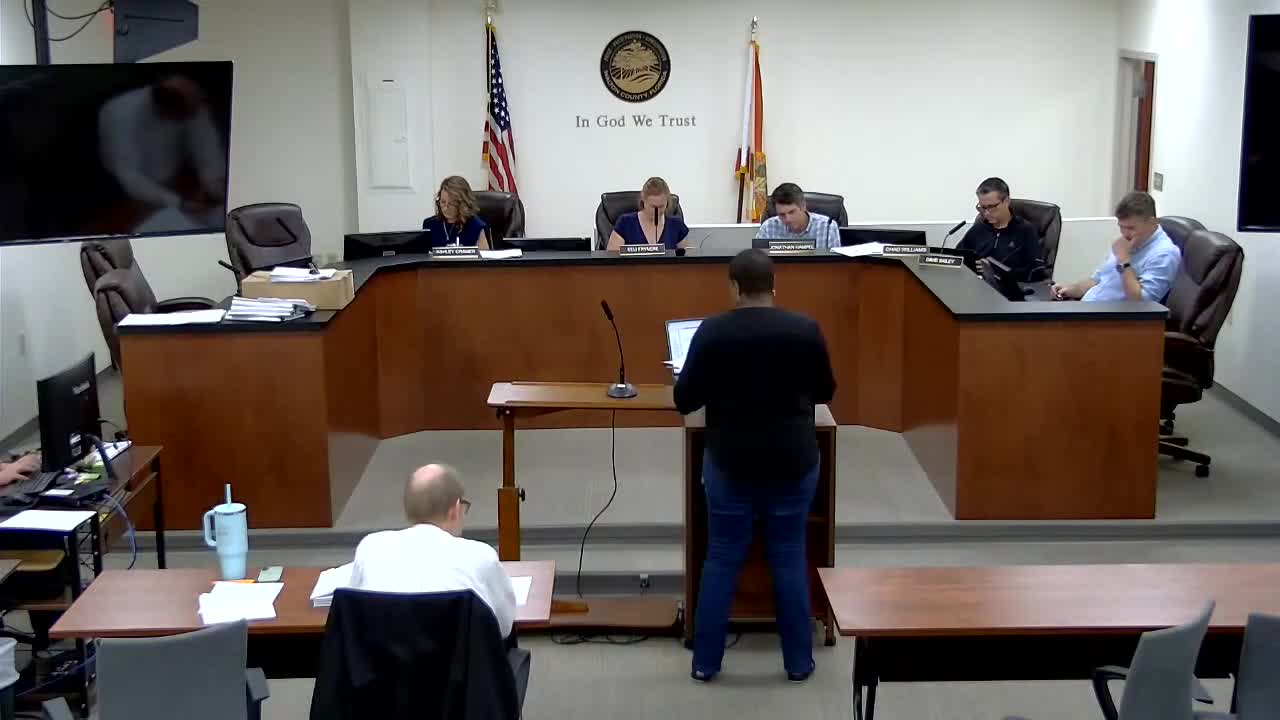 DRB approves Smile Doctors building sign; window vinyl flagged as temporary/advertising